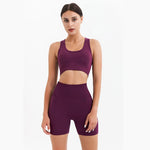 pruple yoga shorts and top